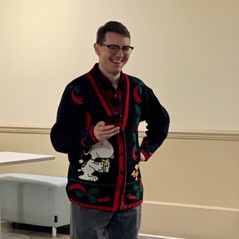Andrew Schwink in a holiday sweater